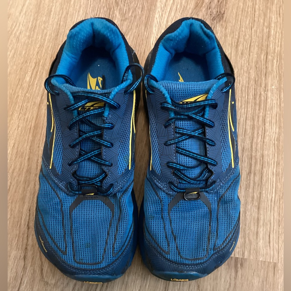 The Altra Olympus 3.5 Trail Running Shoes in Blue are designed for men in size 8